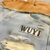 Distressed WUYI Hybrid Denim Shorts
