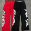 Layered Waist Graffiti Print Distressed Flared Sweatpants Layered Waist Graffiti Print Distressed Flared Sweatpants