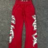 Layered Waist Graffiti Print Distressed Flared Sweatpants Layered Waist Graffiti Print Distressed Flared Sweatpants