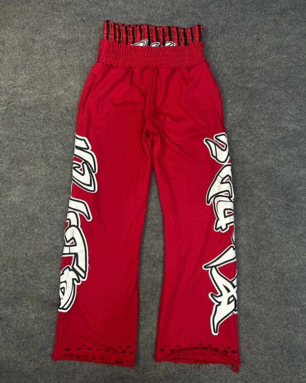 Layered Waist Graffiti Print Distressed Flared Sweatpants Layered Waist Graffiti Print Distressed Flared Sweatpants
